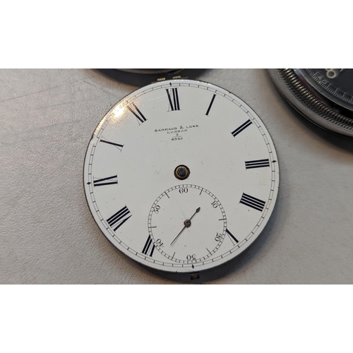 387 - A group of three pocket watches to include a Hamilton having a black dial and subsidiary dials, a Ro... 