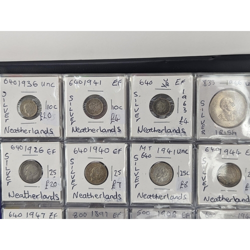 46 - An album of mixed world silver coinage to include a 1912 British Trade Dollar, 1861-1908 Chinese Don... 