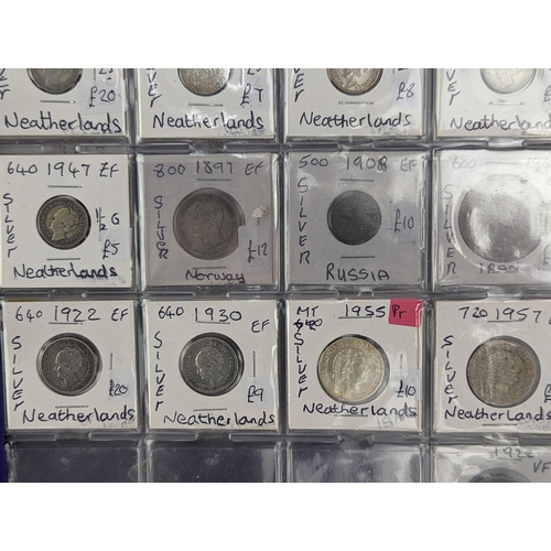 46 - An album of mixed world silver coinage to include a 1912 British Trade Dollar, 1861-1908 Chinese Don... 