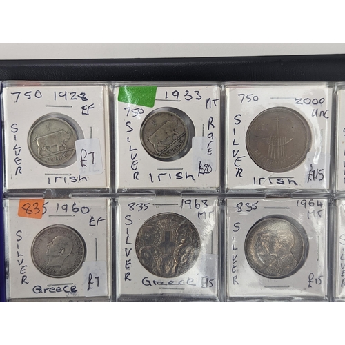 46 - An album of mixed world silver coinage to include a 1912 British Trade Dollar, 1861-1908 Chinese Don... 