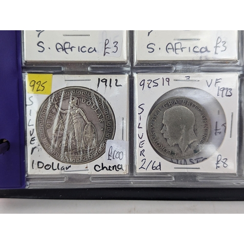 46 - An album of mixed world silver coinage to include a 1912 British Trade Dollar, 1861-1908 Chinese Don... 