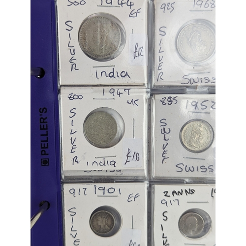 46 - An album of mixed world silver coinage to include a 1912 British Trade Dollar, 1861-1908 Chinese Don... 