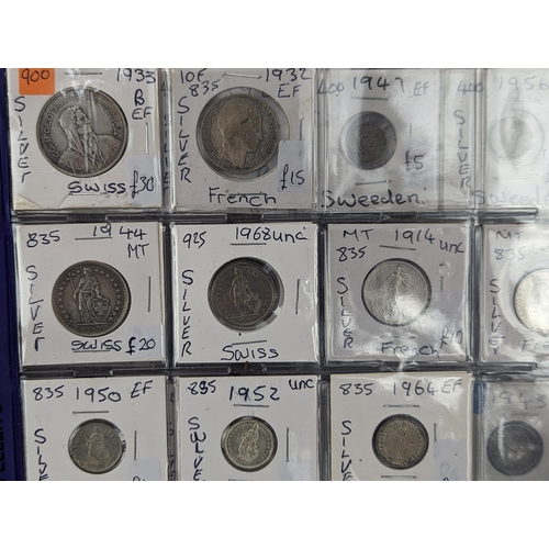 46 - An album of mixed world silver coinage to include a 1912 British Trade Dollar, 1861-1908 Chinese Don... 