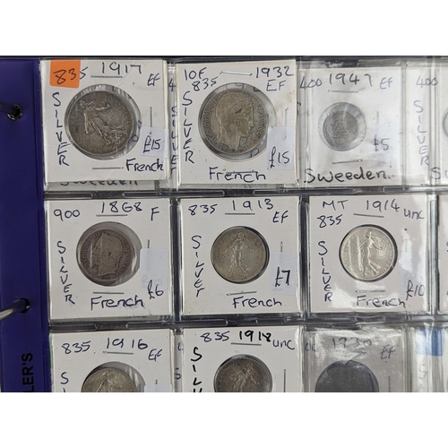 46 - An album of mixed world silver coinage to include a 1912 British Trade Dollar, 1861-1908 Chinese Don... 