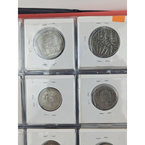 46 - An album of mixed world silver coinage to include a 1912 British Trade Dollar, 1861-1908 Chinese Don... 