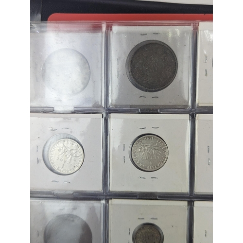 46 - An album of mixed world silver coinage to include a 1912 British Trade Dollar, 1861-1908 Chinese Don... 