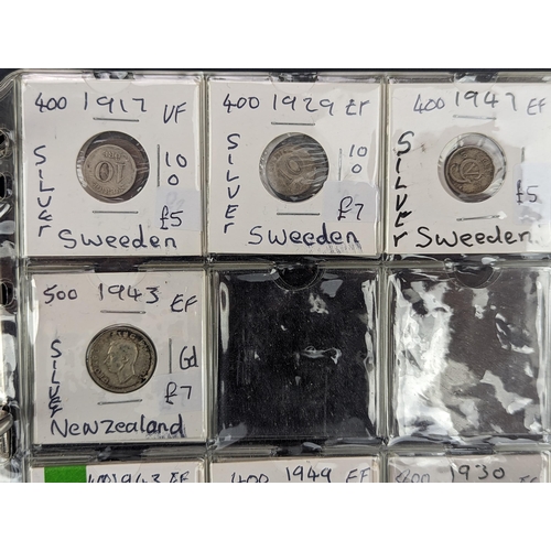 46 - An album of mixed world silver coinage to include a 1912 British Trade Dollar, 1861-1908 Chinese Don... 