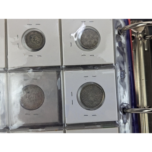 46 - An album of mixed world silver coinage to include a 1912 British Trade Dollar, 1861-1908 Chinese Don... 