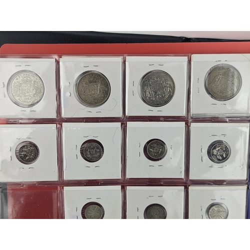 46 - An album of mixed world silver coinage to include a 1912 British Trade Dollar, 1861-1908 Chinese Don... 