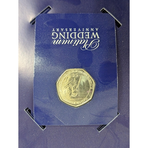 58 - A Queen Elizabeth II fifty pence coin collection binder, containing approximately forty five 50p's t... 