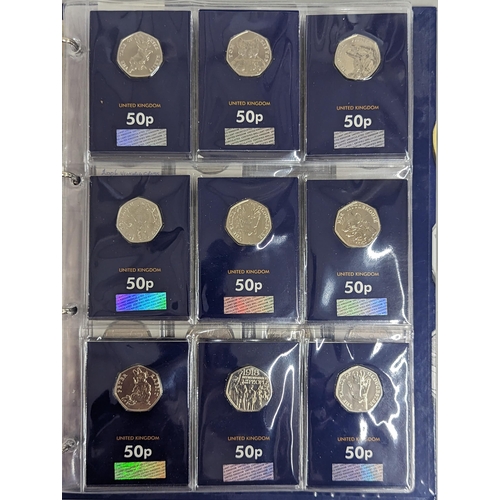 59 - A change checker binder containing approximately twenty five 10 pence coins, to include Angel of the... 