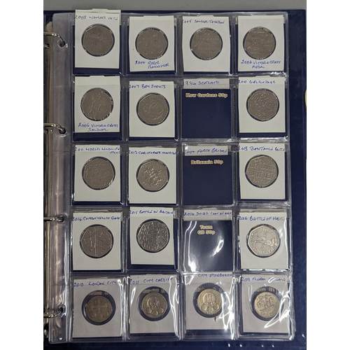 59 - A change checker binder containing approximately twenty five 10 pence coins, to include Angel of the... 