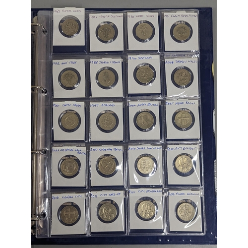 59 - A change checker binder containing approximately twenty five 10 pence coins, to include Angel of the... 