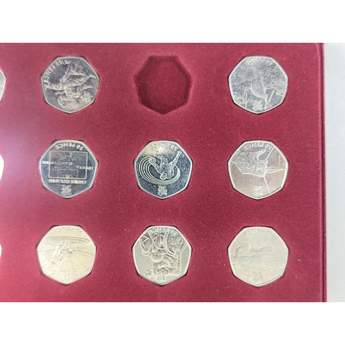 62 - London 2012 Olympic Games 50p collection, 28/29, to include football, archery and tennis, in a red p... 