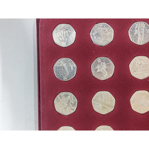 62 - London 2012 Olympic Games 50p collection, 28/29, to include football, archery and tennis, in a red p... 