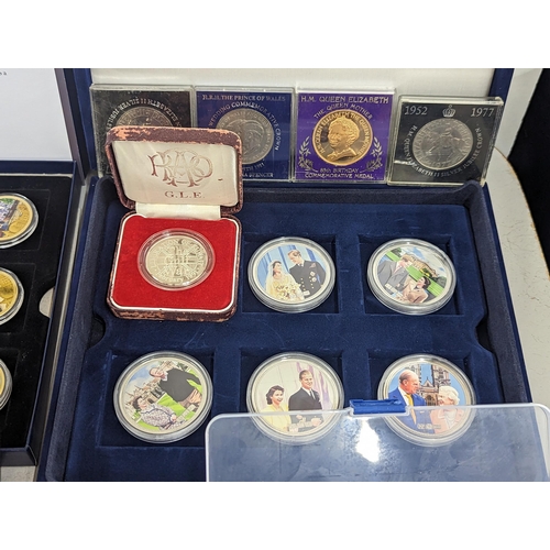 65 - A large group of coins to include Westminster Elizabeth II and Prince Philip Numis proof crowns, Ico... 