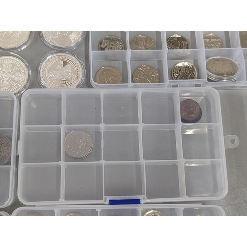 65 - A large group of coins to include Westminster Elizabeth II and Prince Philip Numis proof crowns, Ico... 