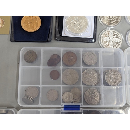 65 - A large group of coins to include Westminster Elizabeth II and Prince Philip Numis proof crowns, Ico... 