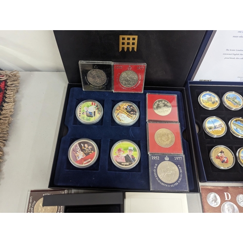 65 - A large group of coins to include Westminster Elizabeth II and Prince Philip Numis proof crowns, Ico... 