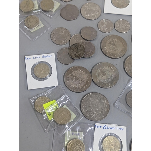 67 - Mixed coins to include a collection of £1 coins, commemorative crown/£5 coins, 50p and 10ps along wi... 