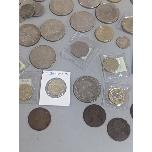 67 - Mixed coins to include a collection of £1 coins, commemorative crown/£5 coins, 50p and 10ps along wi... 