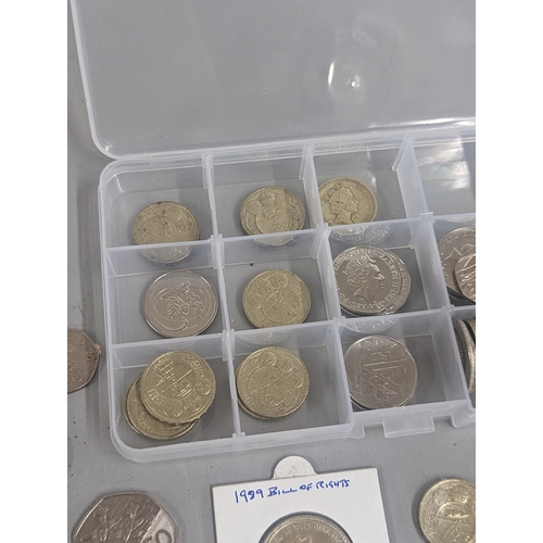 67 - Mixed coins to include a collection of £1 coins, commemorative crown/£5 coins, 50p and 10ps along wi... 