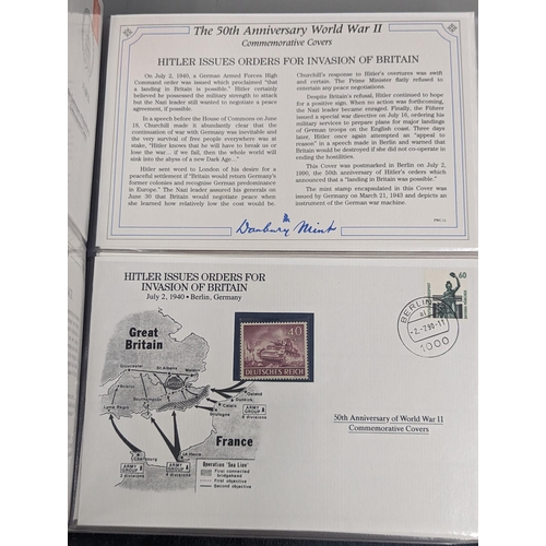 72 - A group of three Danbury Mint The 50th Anniversary World War II Commemorative Covers Collection, in ... 