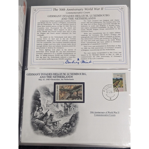 72 - A group of three Danbury Mint The 50th Anniversary World War II Commemorative Covers Collection, in ... 