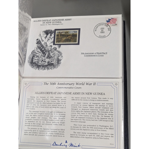 72 - A group of three Danbury Mint The 50th Anniversary World War II Commemorative Covers Collection, in ... 