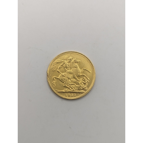 74 - A jewellers restrike of a 1911 full sovereign, testing as 22ct gold, 7.9g, Location:CAB6