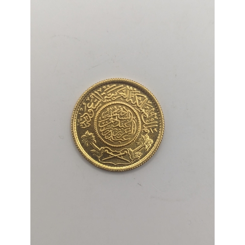 76 - A jewellers restrike 'Commercial Copy' of a Saudi Arabian one Gunagh, testing as 22ct gold, 7.9g Loc... 