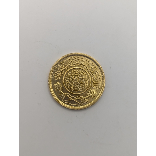 77 - A jewellers restrike 'Commercial Copy' of a Saudi Arabian one Gunagh, testing as 22ct gold, 8.1g Loc... 