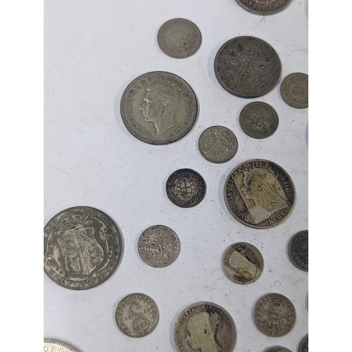 79 - 19th/20th century coinage to include Victorian silver half crowns, florins, Shillings and others, al... 