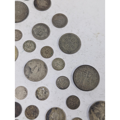 79 - 19th/20th century coinage to include Victorian silver half crowns, florins, Shillings and others, al... 