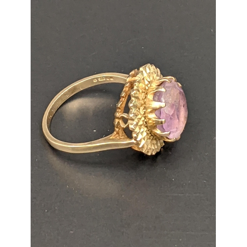 88 - A 9ct gold ring set with a pink coloured stone, total weight 3.7g
Location:CAB2