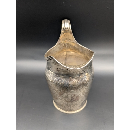 92 - A silver cream jug hallmarked London 1876, total weight 139.4g
Location:A4M