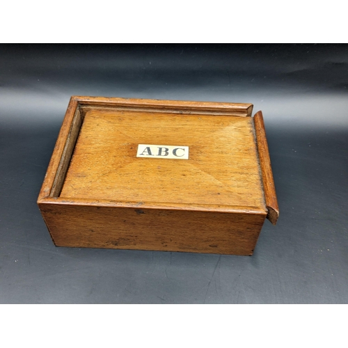 97 - An early 20th century cased set of bone and other scrabble pieces
Location:TABLE