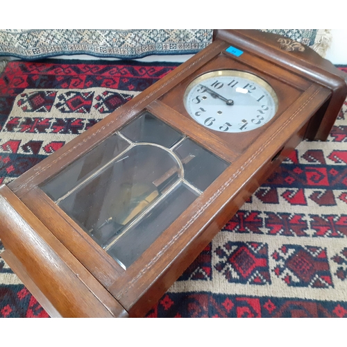 99 - A 1930's oak cased wall clock Location:A4F