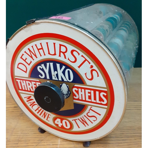 A mid 20th Century Sylko counter top revolving cotton reel dispenser on  feet containing over 100 cot
