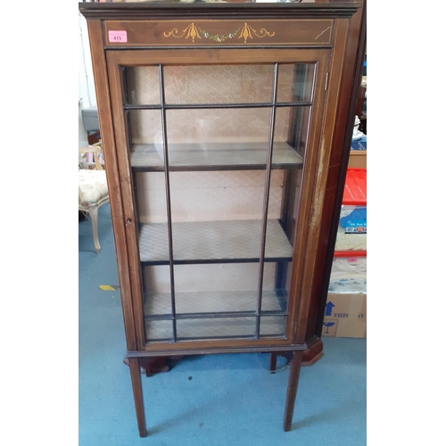 73 - An Edwardian mahogany inlaid display cabinet having three shelves and two glass windows and one glaz... 