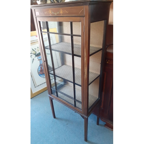 73 - An Edwardian mahogany inlaid display cabinet having three shelves and two glass windows and one glaz... 