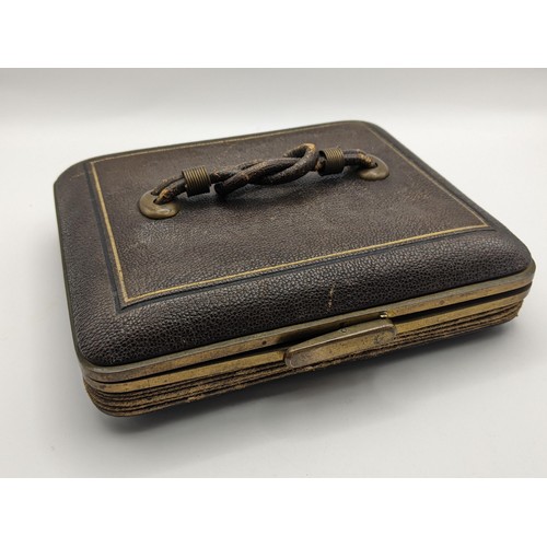 213 - A Victorian brown leather and gilt metal concertina side box, with a knotted top handle, 17cm wide, ... 