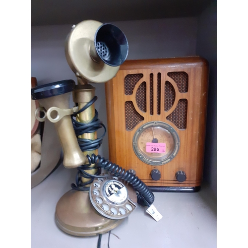 240 - A reproduction wooden cased radio and a reproduction brushed brass telephone, and a 20th century nai... 