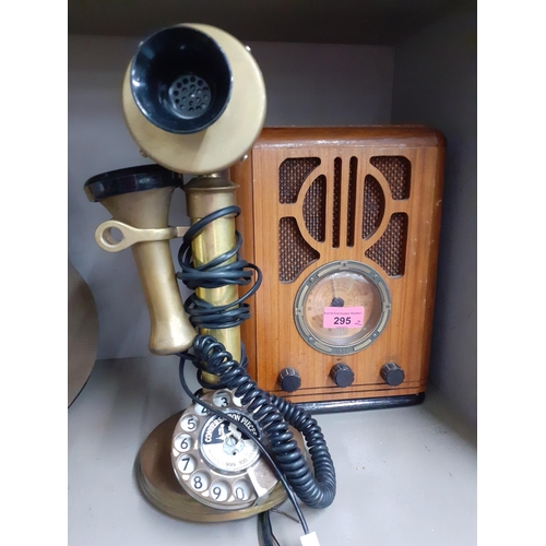 240 - A reproduction wooden cased radio and a reproduction brushed brass telephone, and a 20th century nai... 