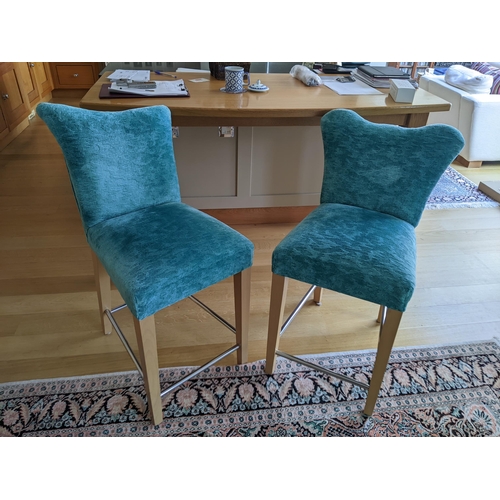 320 - A pair of modern green fabric upholstered bar stools on beech legs with chrome stretchers
Location: ... 