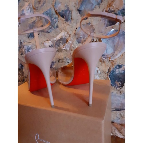 Christian Louboutin A pair of pink beige 4 stiletto shoes having clear heel strap leather ankle st