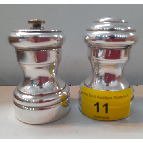 11 - A pair of sterling silver and wooden grinder and pepper pots, Location:CAB2