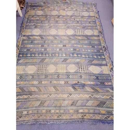 18 - A blue Moroccan cactus silk rug with geometric motifs on a blue ground 236cm x 148cm Location: A3F