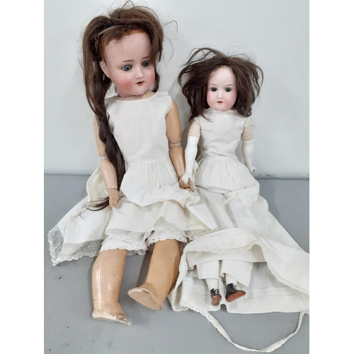 19 - Two early 20th century bisque headed dolls to include Armand Marseille and Simon and Halbig Location... 