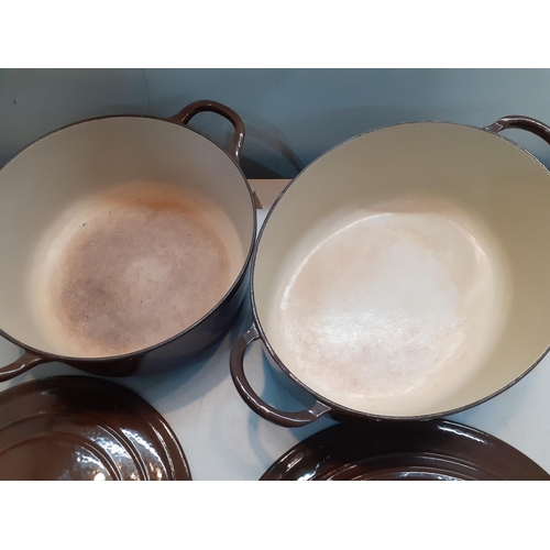 54 - Two Le Cruset brown enamelled oven casserole dishes with lids, Location:10.4